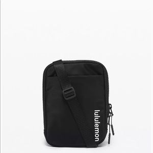 Lululemon Easy access Crossbody. Never used. Still has tags on it.